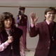 Swami Prem Niren (R), also in the early ‘80s. Note the armed guard in the background.